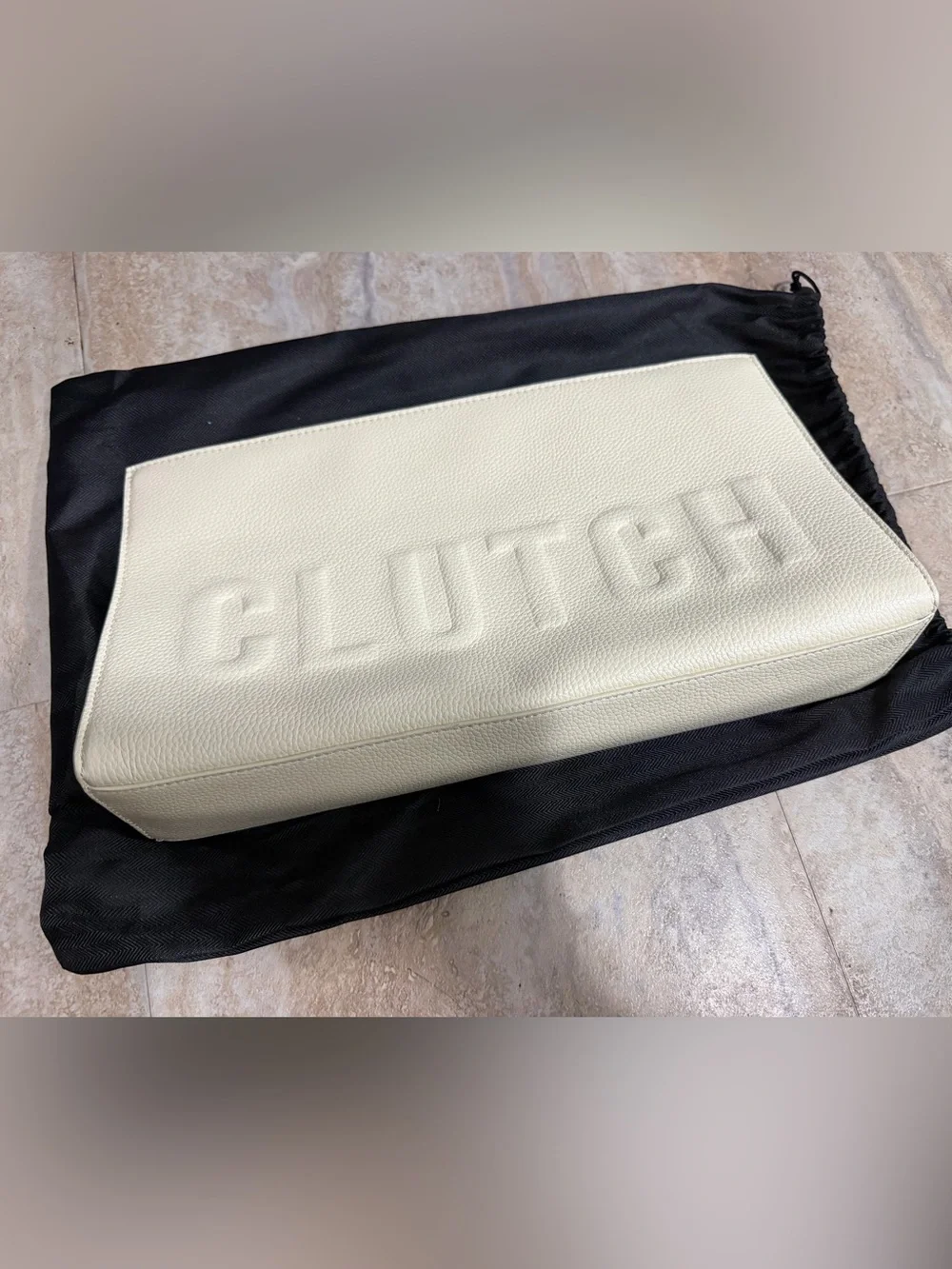 Clutch by B sleek cream